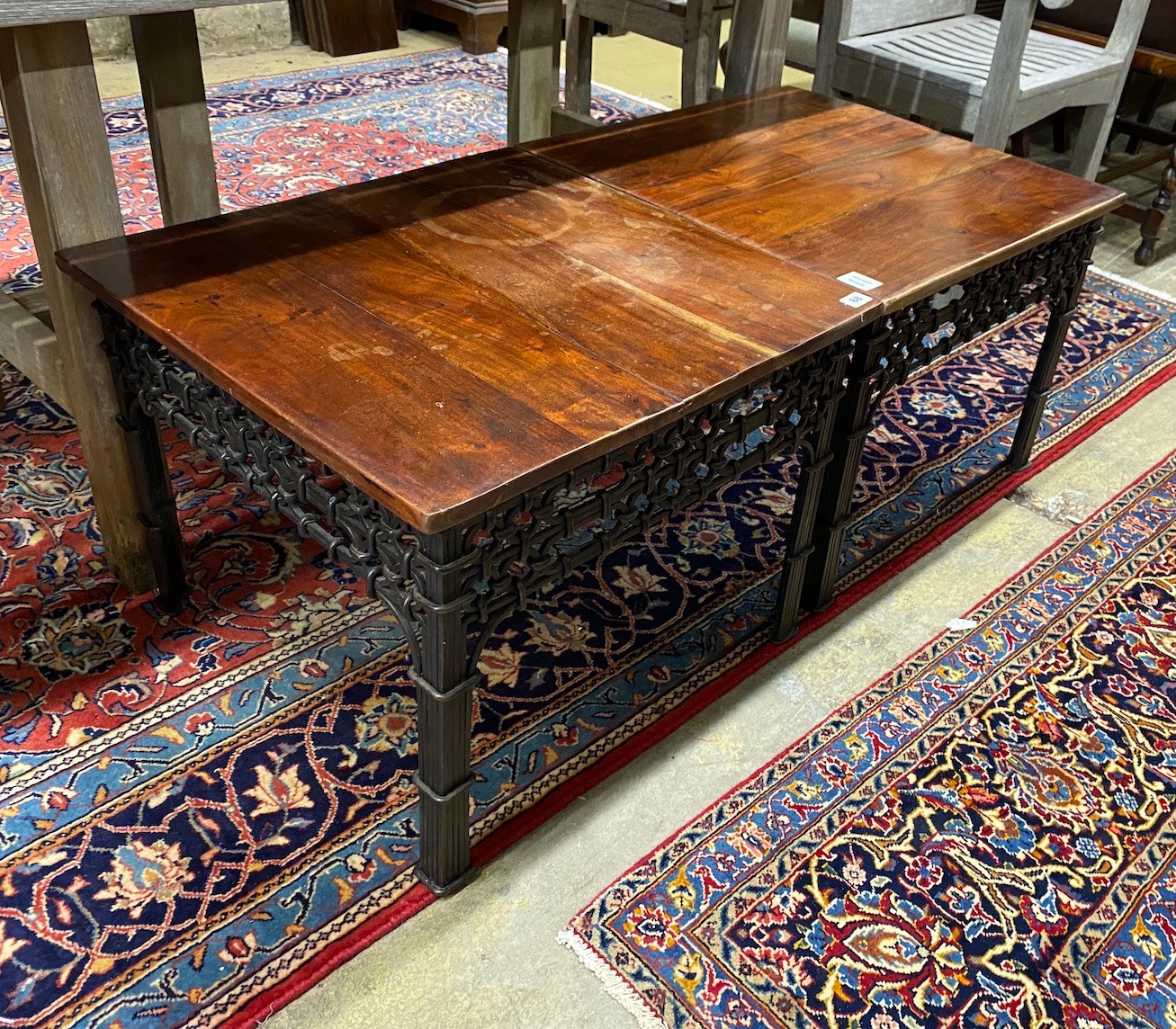 A pair of contemporary hardwood and cast metal square occasional tables, width 60cm, height 47cm